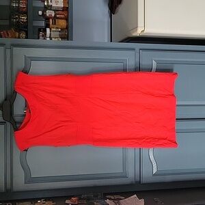 Like new red dress, ribbed sides stretchy. Side inserts